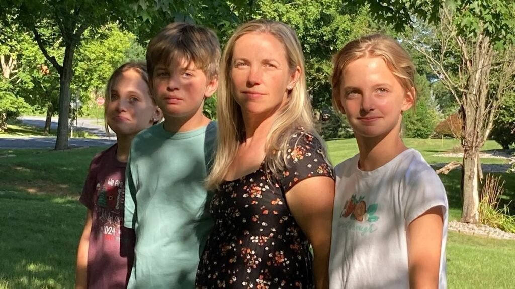 Anna Clement stands with her children Caroline, Cole and Grace outside their Pennsylvania home.