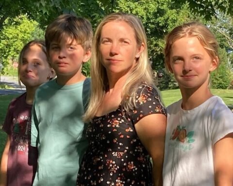 Anna Clement stands with her children Caroline, Cole and Grace outside their Pennsylvania home.