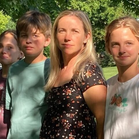 Anna Clement stands with her children Caroline, Cole and Grace outside their Pennsylvania home.
